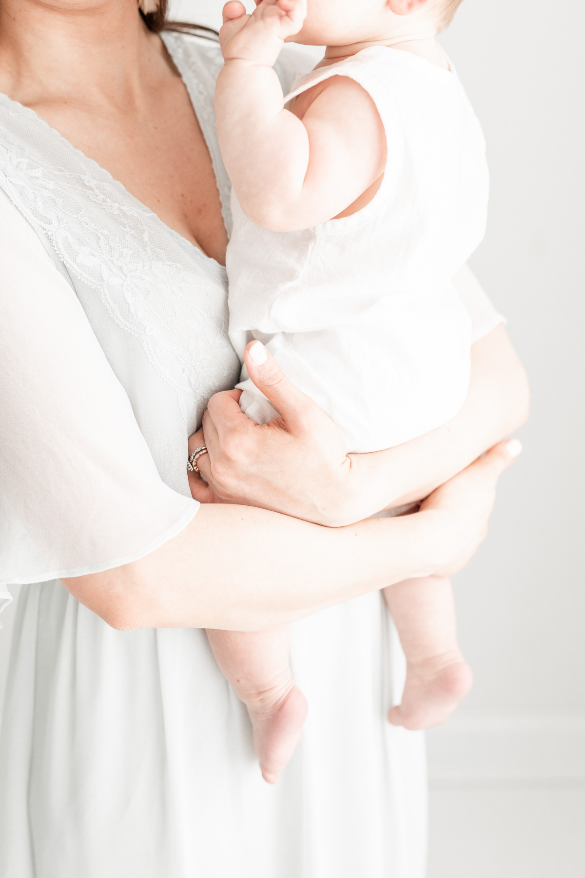 Erin Davison Photography | Cleveland Family Photographers, motherhood photography, mom and baby photos, motherhood session, all white photography studio, studio baby photography, photography session with flowers, family photography, baby photography, Cleveland Ohio, Canton Ohio, Akron Ohio, Ohio newborn photographers, Ohio family photographers, Ohio baby photographers